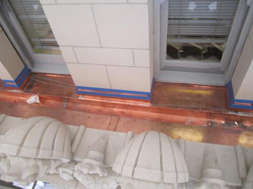 Built-in Gutter and window pans behind GFRC ornaments